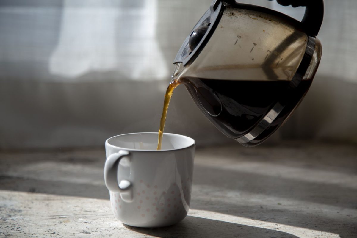 pouring coffee into a mug