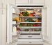 Refrigerator with open doors showing shelves stocked with various fresh produce and packaged food items