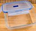 A glass food storage container with a plastic lid